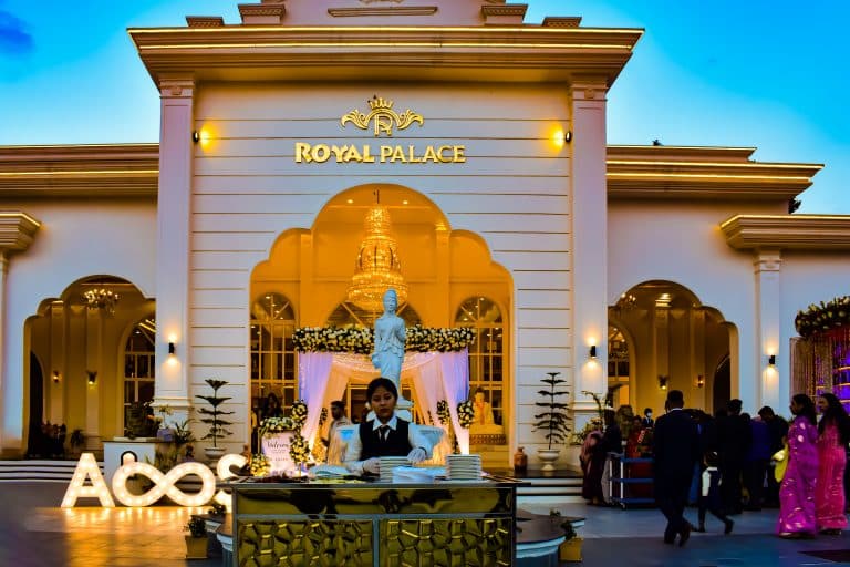 Royal Palace Banquet exterior framed by forest greenery